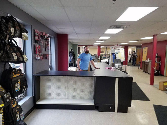 Blodgett Supply teammate smiling at counter